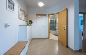 Et badeværelse på 3 Bedroom Awesome Home In Liznjan