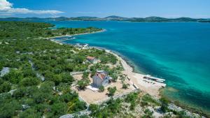 an aerial view of an island in the water at Villa Maris in Betina