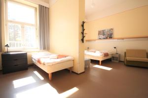 Postel nebo postele na pokoji v ubytování Forenom Hostel Röykkä