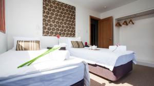 Ένα ή περισσότερα κρεβάτια σε δωμάτιο στο Itoku