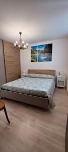 Ένα ή περισσότερα κρεβάτια σε δωμάτιο στο Appartamenti Sasso Rosso