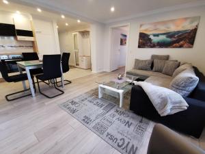 Fotografie z fotogalerie ubytování NEU Ferienhaus Musenburg Apartment W2 v destinaci Stedesand