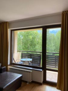 Balkón nebo terasa v ubytování M&R Apartment C13 - SPA Terra Complex