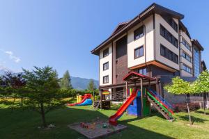 Herní místnost nebo prostor pro děti v ubytování M&R Apartment C13 - SPA Terra Complex