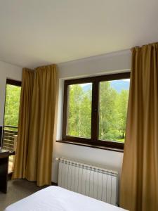 Postel nebo postele na pokoji v ubytování M&R Apartment C13 - SPA Terra Complex