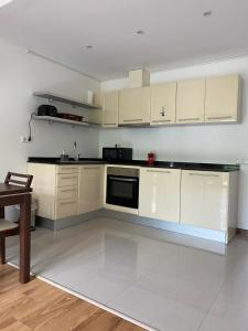 Kuchyň nebo kuchyňský kout v ubytování M&R Apartment C13 - SPA Terra Complex