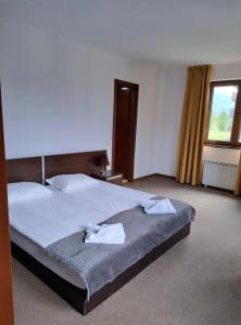 Postel nebo postele na pokoji v ubytování M&R Apartment C13 - SPA Terra Complex