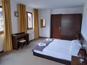 Postel nebo postele na pokoji v ubytování M&R Apartment C13 - SPA Terra Complex