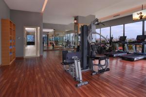 a gym with cardio equipment in a building at Citadines Gatot Subroto Jakarta in Jakarta