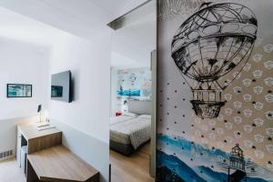 Postel nebo postele na pokoji v ubytování Hotel La Serena
