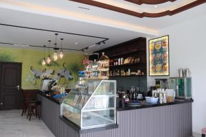 a counter in a restaurant with a counter sidx sidx sidx at Blue Sea Hue Hotel in Hue
