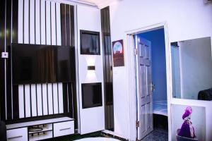 Baðherbergi á Homely 1-Bed-Apt With 24hrs Power & Fast Internet