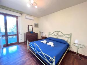 Postel nebo postele na pokoji v ubytování Vittoria Apartament