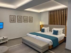 Giường trong phòng chung tại Les Orangers Garden Villas and Bungalows Ultra All inclusive