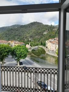 a view of a river from a balcony at Bellavista in Dolceacqua