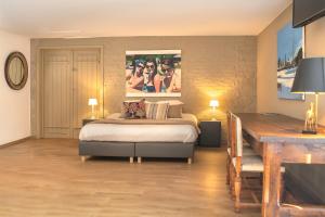 TV a/nebo společenská místnost v ubytování Guesthouse Brouwershuis