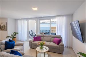 Posezení v ubytování Villa Smaragd - Lapis - Luxury Apartment With Shared Pool
