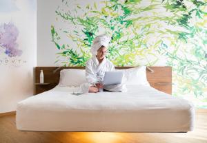 Postel nebo postele na pokoji v ubytování QC Room San Pellegrino