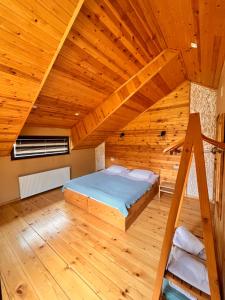Uma cama ou camas num quarto em Ioska's House