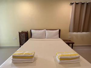 Postel nebo postele na pokoji v ubytování Boracay Amor Apartment (Garden)