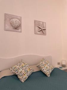 Costa Paradiso Apartment tesisinde bir odada yatak veya yataklar