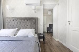 Postel nebo postele na pokoji v ubytování Palanga Park Hotel