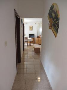 Televízia a/alebo spoločenská miestnosť v ubytovaní Apartments Marija