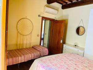Posteľ alebo postele v izbe v ubytovaní relais L’Imperatore