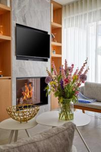 TV a/nebo společenská místnost v ubytování ABC Hotel