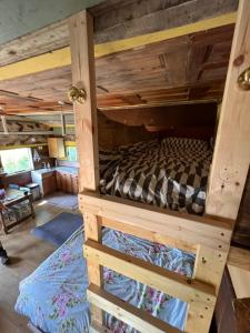 a bedroom with a bunk bed in a house at Foxglove lodge in Llanelli