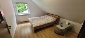 Łóżko lub łóżka w pokoju w obiekcie Apartament Zacisze