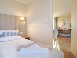 Ein Bett oder Betten in einem Zimmer der Unterkunft Strandvillen Heringsdorf
