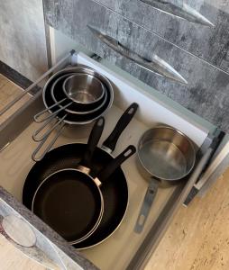 Kuchyň nebo kuchyňský kout v ubytování RAWAN RESIDENCY