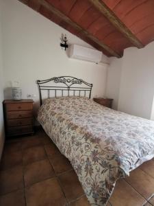 Postel nebo postele na pokoji v ubytování Casa Rural El Gandulillo