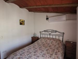 Postel nebo postele na pokoji v ubytování Casa Rural El Gandulillo