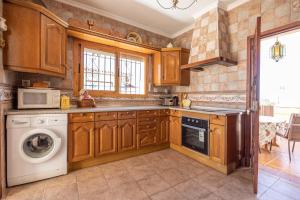 Kuchyňa alebo kuchynka v ubytovaní Villa de alquiler vacacional en Nerja Calle Solana