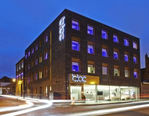 a building with a sign on the side of it at Bloc Hotel Birmingham in Birmingham