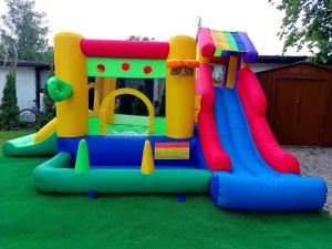 a inflatable play set in a yard at Spokojny zakątek in Ustroń