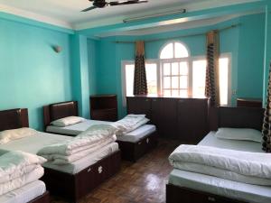 Un ou plusieurs lits dans un hébergement de l'établissement Hello KTM Hostel