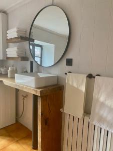 a bathroom with a sink and a mirror at Casa Pirri in Espinama +19 photos