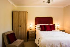 Postel nebo postele na pokoji v ubytování The Broadmead Boutique B&B