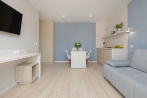 Posezení v ubytování BURSZTYN - BERNSTEIN APARTMENTS + 37 fotografií