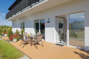 Balkón nebo terasa v ubytování BURSZTYN - BERNSTEIN APARTMENTS