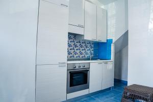 Cucina o angolo cottura di La Maison De La Ville