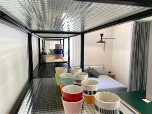 a room with a bed andools on a balcony at Bakke Design Loft in Sestri Levante