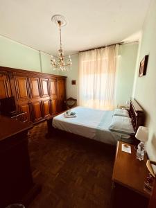 A bed or beds in a room at Affittacamere Umberto&Marisa