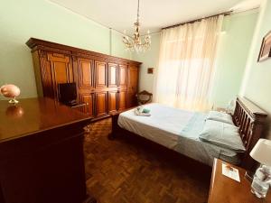 A bed or beds in a room at Affittacamere Umberto&Marisa