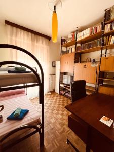 A bed or beds in a room at Affittacamere Umberto&Marisa