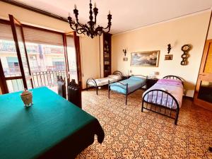 A bed or beds in a room at Affittacamere Umberto&Marisa