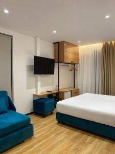 Postel nebo postele na pokoji v ubytování NOI HOTEL